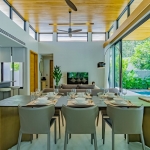 3-bedroom pool villa near Blue Tree in Cherng Talay, Phuket open plan living, dining and kitchen area with ribbon windows PSV-CHE-1589