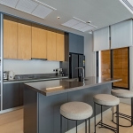 3-bedroom pool villa near Blue Tree in Cherng Talay, Phuket gray and wood kitchen with breakfast island PSV-CHE-1589
