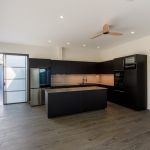 3-bedroom pool in Soi Samakki, Rawai, Phuket kitchen area with island and ceiling fan PSV-RAW-1596