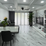 3-bedroom condo in Kamala, Phuket dining and lounge area PSC-KAM-1604