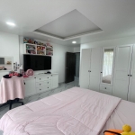 3-bedroom condo in Kamala, Phuket bedroom with all white furniture and study table PSC-KAM-1604