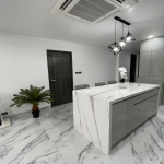3-bedroom condo in Kamala, Phuket kitchen island with pendant lights PSC-KAM-1604