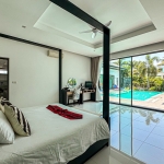 4-bedroom pool villa near Friendship Beach in Rawai, Phuket bedroom with red bed runner and pool access PSV-RAW-1590