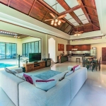 4-bedroom pool villa near Bang Tao Beach, Phuket open plan living, dining and kitchen area with pool access PSV-BAN-1585