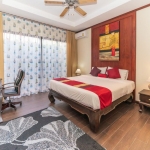 4-bedroom pool villa near Bang Tao Beach, Phuket bedroom with black and gray flowered rug PSV-BAN-1585