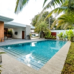4-bedroom pool villa in Soi Samakki, Rawai Phuket pool area with tropical plants PSV-RAW-1583