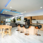 4-bedroom pool villa in Soi Samakki, Rawai Phuket open plan living, dining and kitchen with breakfast island PSV-RAW-1583