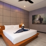 4-bedroom pool villa near Rawai & Nai Harn Beaches in Phuket bedroom with elephant painting PSV-RAW-1602