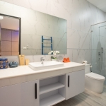 4-bedroom pool villa near Rawai & Nai Harn Beaches in Phuket white bathroom with blue towel ladder PSV-RAW-1602