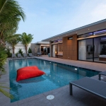 4-bedroom pool villa near Rawai & Nai Harn Beaches in Phuket pool with red floaty PSV-RAW-1602