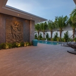 4-bedroom pool villa near Rawai & Nai Harn Beaches in Phuket wall feature and pool deck PSV-RAW-1602