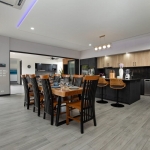 4-bedroom pool villa near Rawai & Nai Harn Beaches in Phuket kitchen and dining area with wood & black finish PSV-RAW-1602