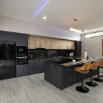 4-bedroom pool villa near Rawai & Nai Harn Beaches in Phuket kitchen area with breakfast island PSV-RAW-1602