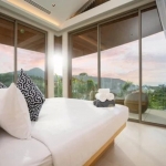 5-bedroom pool villa for sale near Kamala Beach, Phuket bedroom with floor to ceiling glass walls and doors and balcony access PSV-KAM-1587