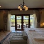 5-bedroom pool villa in Chalong, Phuket bedroom with bench bed and chandelier PSV-CHA-1584