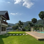 5-bedroom pool villa in Chalong, Phuket exterior and pool with mountain backdrop PSV-CHA-1584