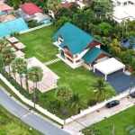 5-bedroom pool villa in Chalong, Phuket aerial view showing the villa on a large plot PSV-CHA-1584