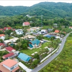 5-bedroom pool villa in Chalong, Phuket aerial view showing the surrounding area with mountain backdrop PSV-CHA-1584