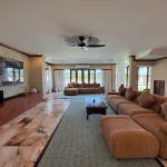 5-bedroom pool villa in Chalong, Phuket 2 seating areas with brown couches PSV-CHA-1584