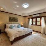 5-bedroom pool villa in Chalong, Phuket bedroom with marble floors and cream rug PSV-CHA-1584